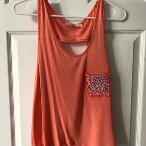 Pink tank with detailed front pocket